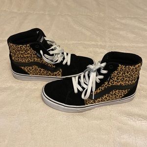 Women’s size 7.5 high top leopard and black Vans.  EUC